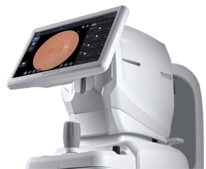 View of the operator's side of the Huvitz HFC-1 Non-Mydriatic Fundus Camera, showing a touch screen with an image of the retina, along with the control stick and side body of the retinal camera.